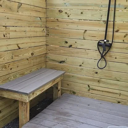 Wood seating and an outdoor privacy screen