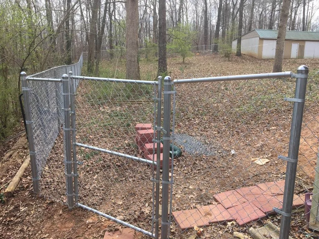 Galvanized chain-link walk gate, shared-library reference